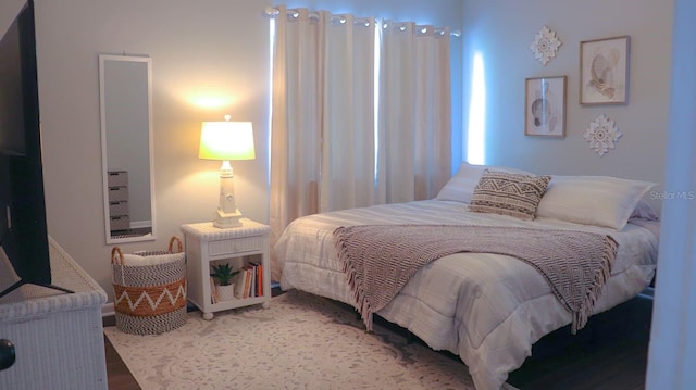 bedroom featuring hardwood / wood-style floors