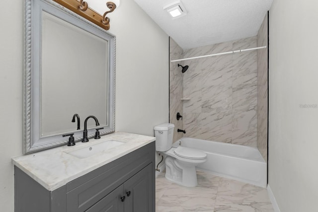 full bathroom with tiled shower / bath, vanity, toilet, and a textured ceiling