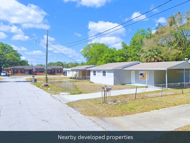 view of front of home with a front lawn