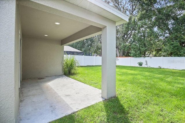 view of yard with a patio area