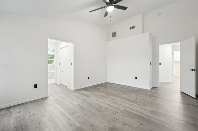 spare room featuring ceiling fan and light wood-type flooring