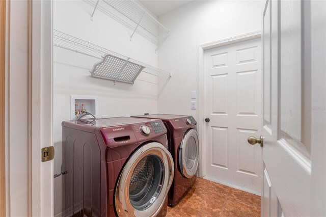 laundry area featuring washer and clothes dryer