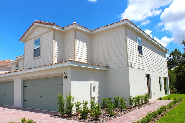 view of front of property featuring a garage