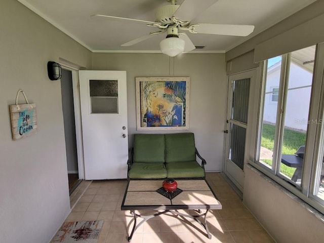 sunroom / solarium with ceiling fan