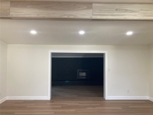 unfurnished room featuring dark hardwood / wood-style floors