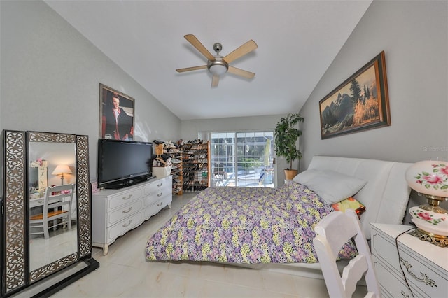 bedroom featuring lofted ceiling, ceiling fan, and light tile patterned floors