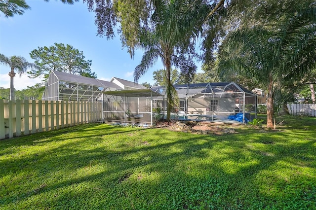 view of yard featuring a lanai