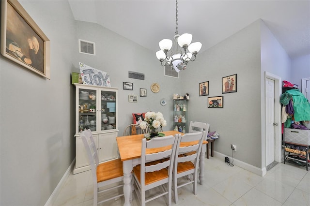 dining area with an inviting chandelier and vaulted ceiling