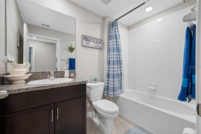 full bathroom featuring vanity, toilet, shower / bath combination with curtain, and tile patterned floors