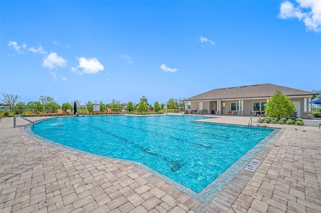 view of pool with a patio area