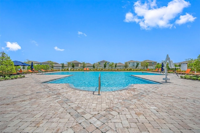 view of pool featuring a patio area