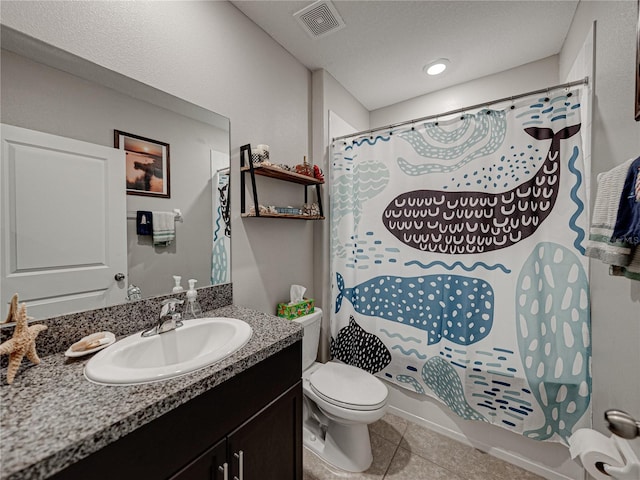 full bathroom with toilet, tile patterned flooring, vanity, a textured ceiling, and shower / bath combo with shower curtain