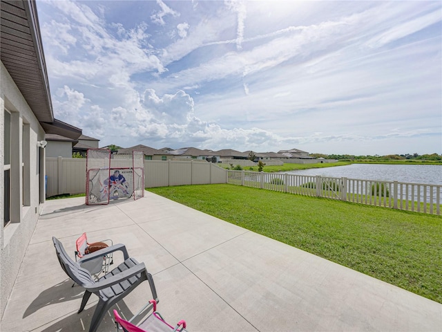 view of patio / terrace featuring a water view