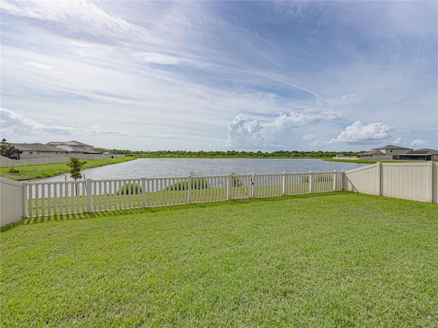 view of yard with a water view