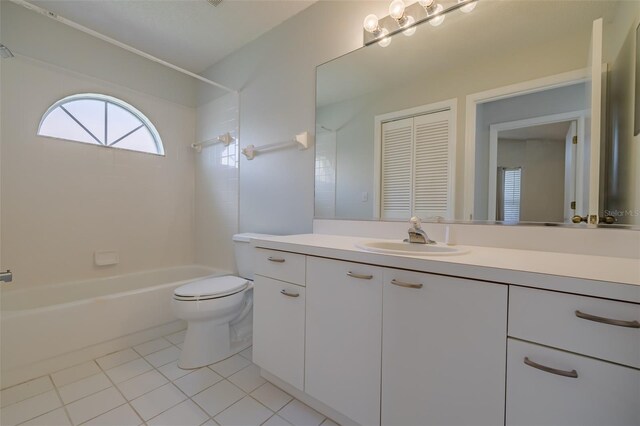 full bathroom with shower / bathing tub combination, vanity, toilet, and tile patterned flooring