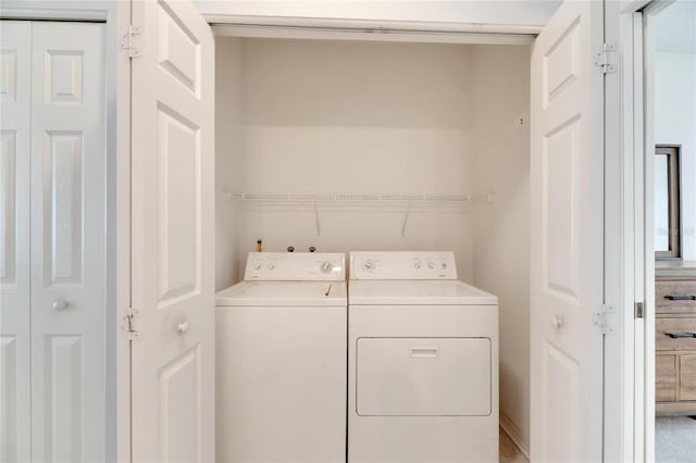 laundry area featuring washer and clothes dryer