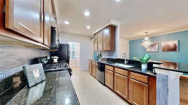 kitchen with black appliances, a notable chandelier, tasteful backsplash, crown molding, and sink