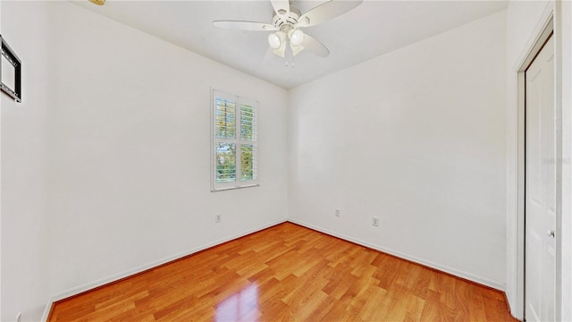 unfurnished bedroom with ceiling fan and light hardwood / wood-style flooring