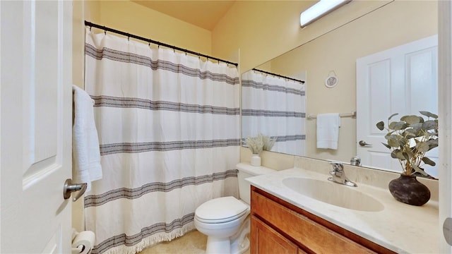 bathroom with walk in shower, toilet, and vanity