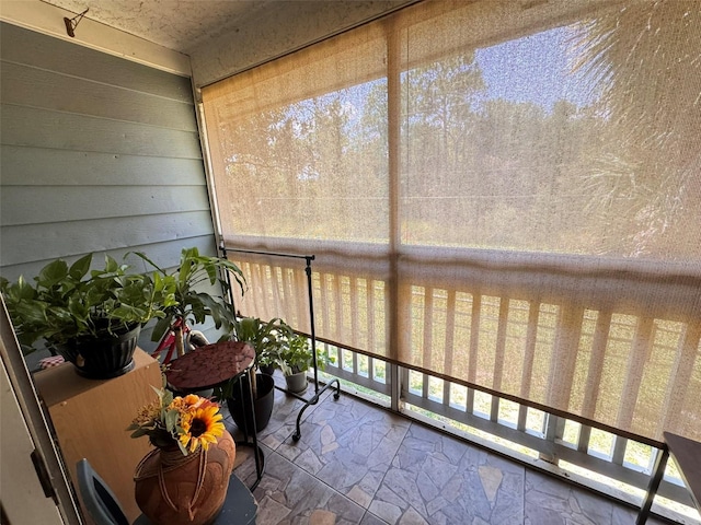 sunroom / solarium with plenty of natural light