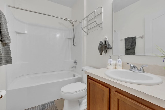 full bathroom featuring shower / bathing tub combination, vanity, and toilet