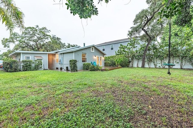 view of front of home with a front yard