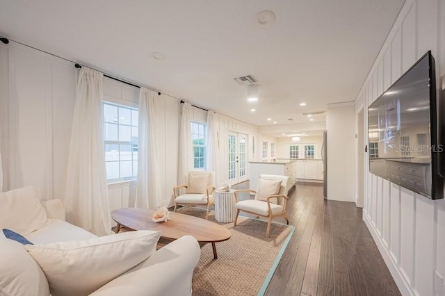 living room with dark wood-type flooring