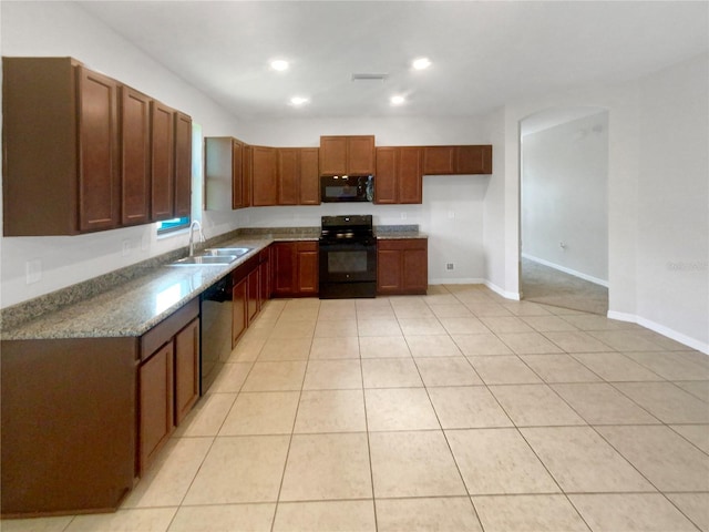 13292 Sea Bridge Dr, Hudson, FL 34669 - kitchen featuring a sink, visible vents, black appliances, and light tile patterned floors