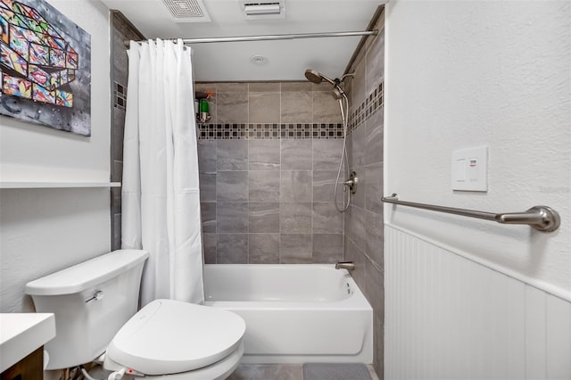 full bathroom with toilet, vanity, and shower / bathtub combination with curtain