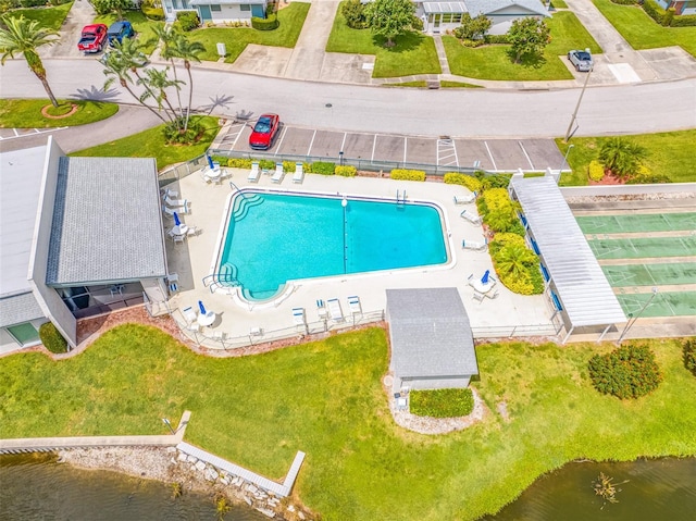 birds eye view of property featuring a water view