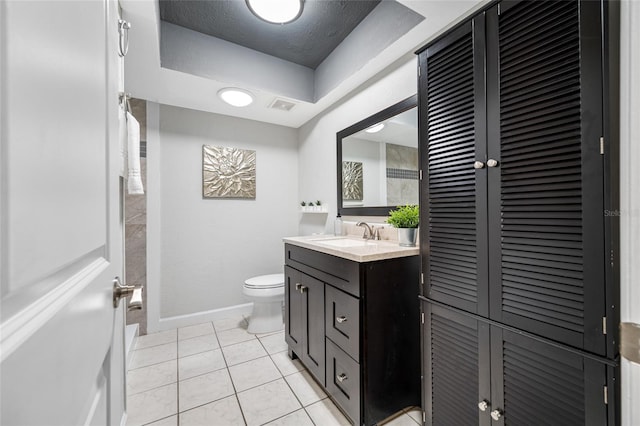 full bathroom with vanity, visible vents, baseboards, tile patterned flooring, and toilet