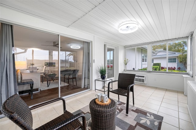 sunroom with wooden ceiling and a wall mounted AC