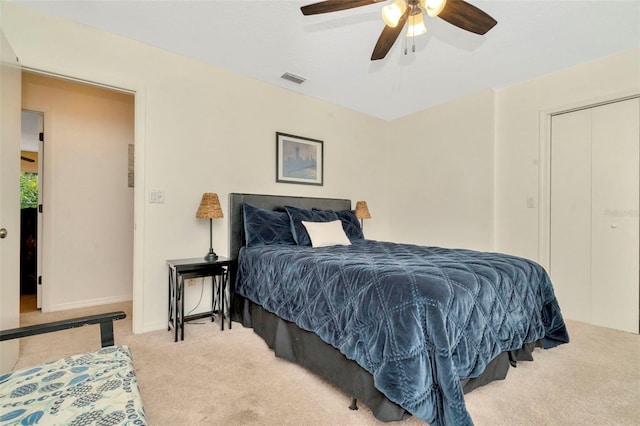 carpeted bedroom featuring ceiling fan