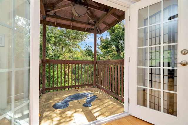 wooden deck featuring ceiling fan