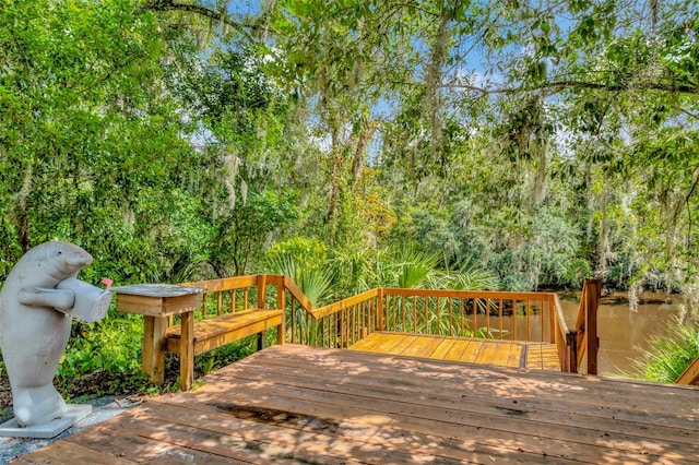 deck featuring a water view