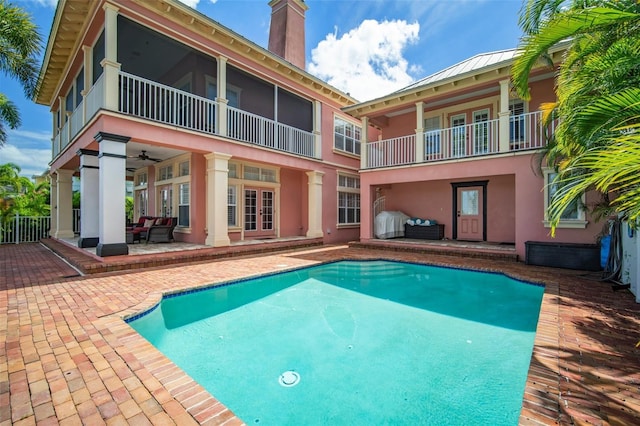 825 Islebay Dr, Apollo Beach, FL 33572 - pool with an outdoor living space, a patio, french doors, and a ceiling fan