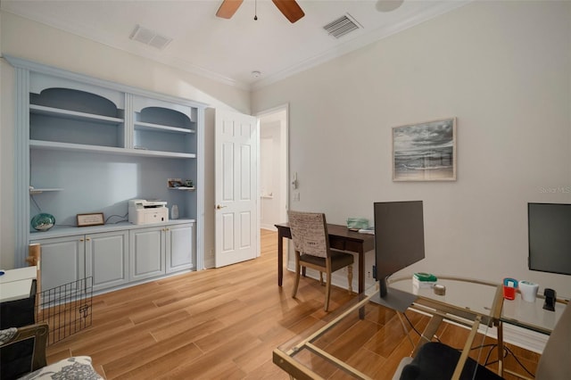 office space featuring crown molding, light hardwood / wood-style flooring, and ceiling fan