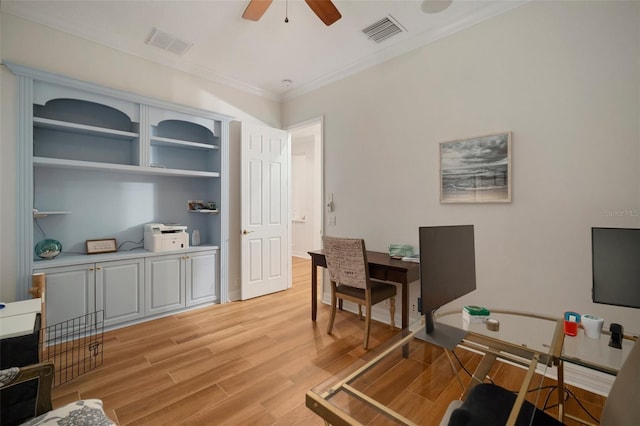 825 Islebay Dr, Apollo Beach, FL 33572 - home office featuring crown molding, ceiling fan, visible vents, and light wood-type flooring