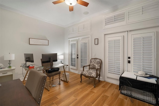 office area with light wood-type flooring, french doors, ornamental molding, and ceiling fan