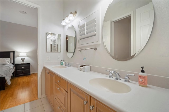 bathroom with wood-type flooring and vanity