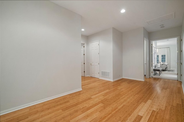 825 Islebay Dr, Apollo Beach, FL 33572 - empty room with baseboards, visible vents, recessed lighting, and light wood-type flooring
