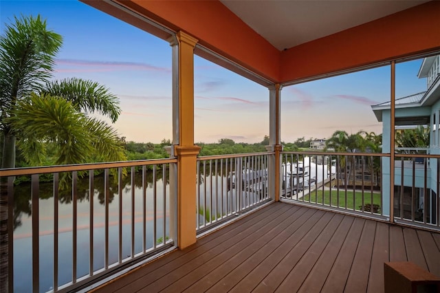 deck at dusk with a water view