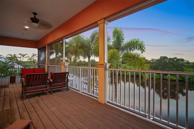 deck at dusk with a water view