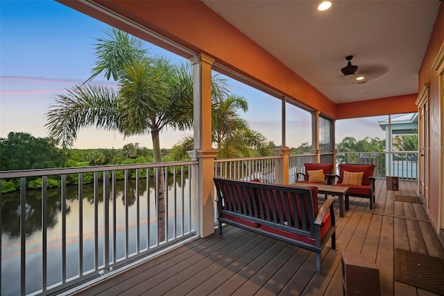 deck at dusk with a water view