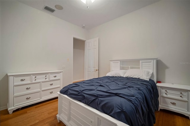 825 Islebay Dr, Apollo Beach, FL 33572 - bedroom with visible vents and wood finished floors