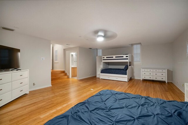 825 Islebay Dr, Apollo Beach, FL 33572 - bedroom featuring baseboards, visible vents, and light wood finished floors