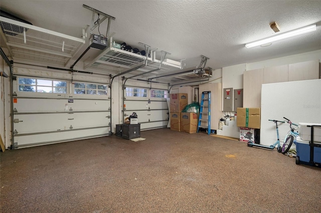 825 Islebay Dr, Apollo Beach, FL 33572 - garage with electric panel and a garage door opener