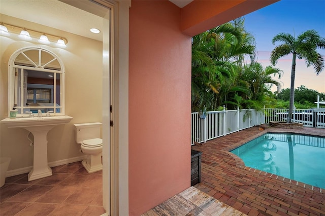 825 Islebay Dr, Apollo Beach, FL 33572 - view of pool featuring a fenced in pool, fence, and a patio