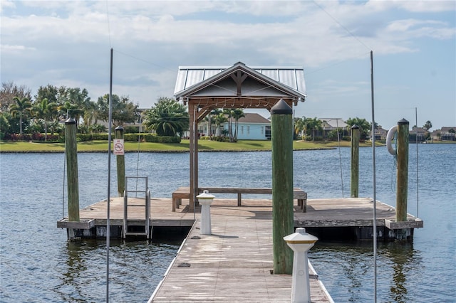 view of dock with a water view and a gazebo