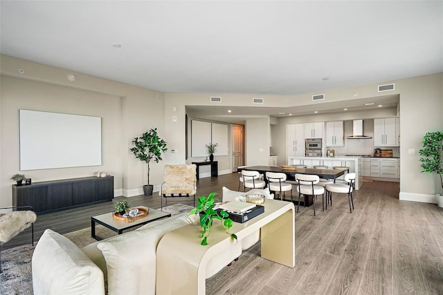 living room with light hardwood / wood-style floors